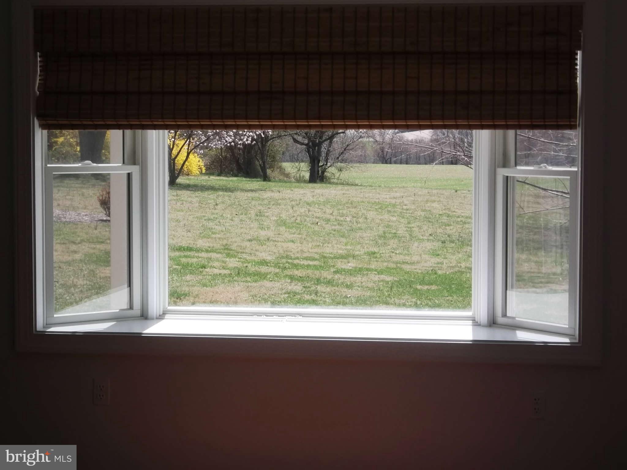 3317 Mt Carmel Road Upperco, MD 21155 - Photo 6 of 21 a view of a balcony and floor to ceiling window