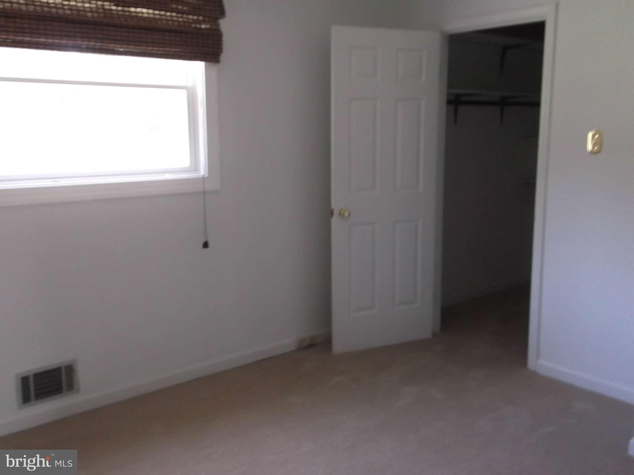 3317 Mt Carmel Road Upperco, MD 21155 - Photo 8 of 21 a view of an empty room with a window
