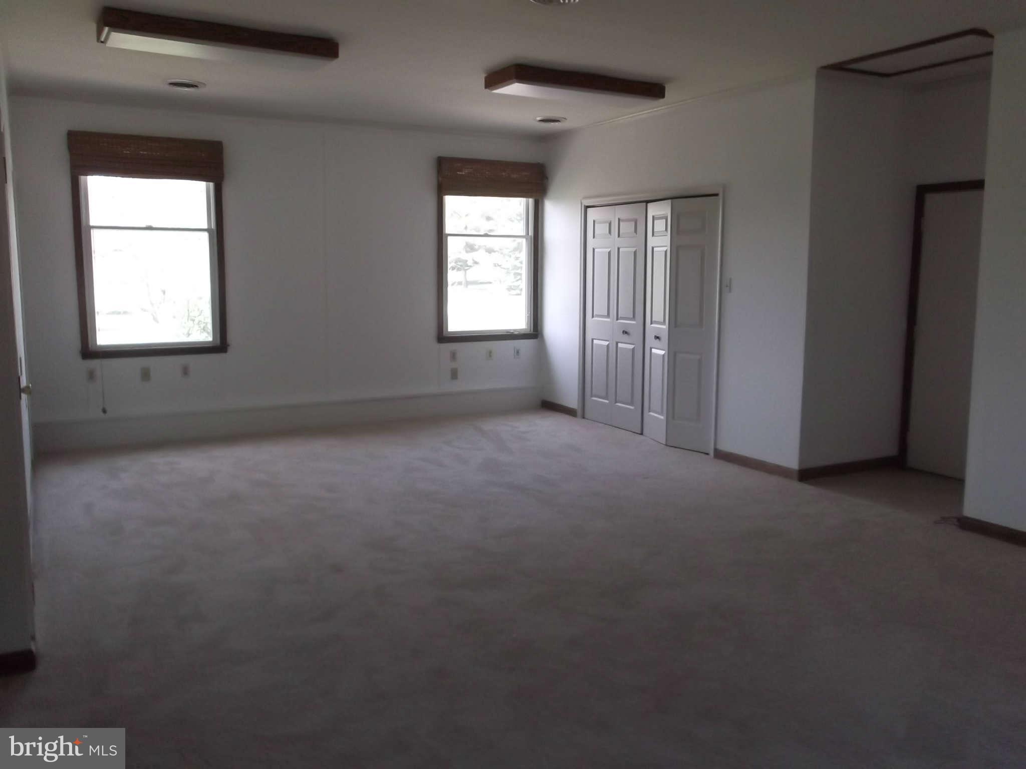 3317 Mt Carmel Road Upperco, MD 21155 - Photo 10 of 21 an empty room with windows