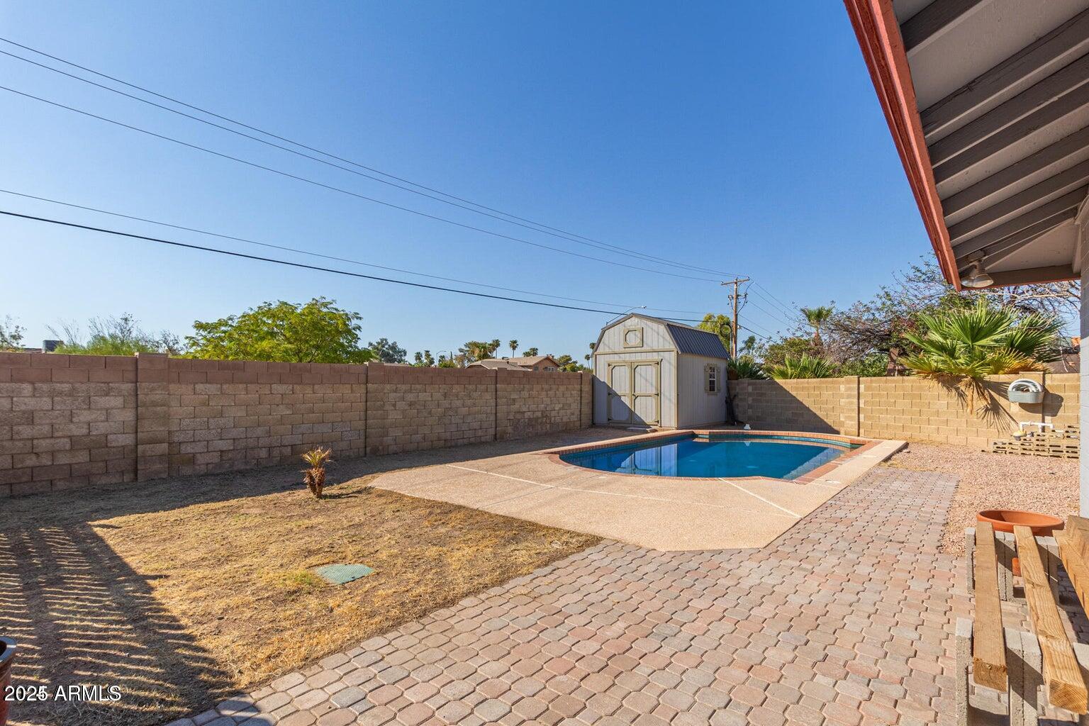 1316 North Spring Circle Mesa, AZ 85203 - Photo 13 of 14 a view of a swimming pool