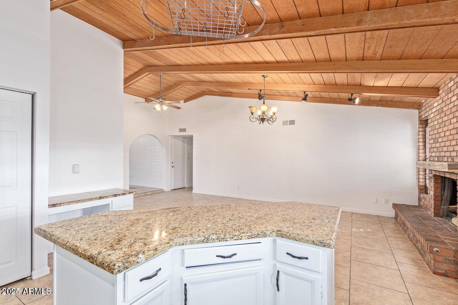 1316 North Spring Circle Mesa, AZ 85203 - Photo 3 of 14 a view of a kitchen counter top space and utility room