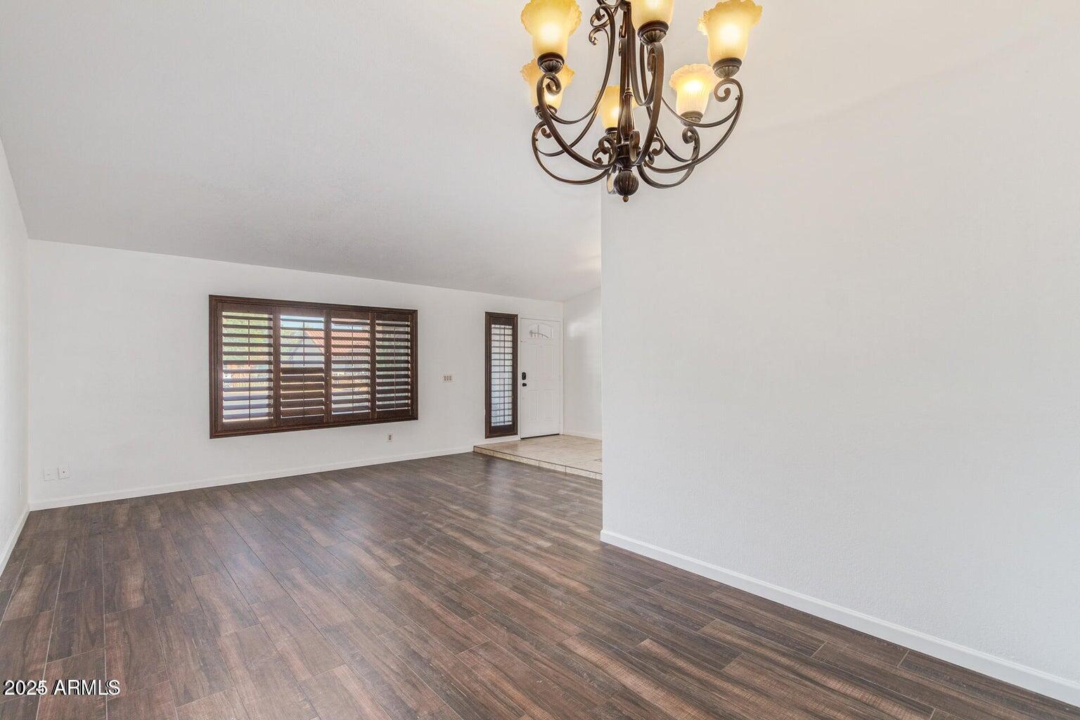 1316 North Spring Circle Mesa, AZ 85203 - Photo 6 of 14 wooden floor in a empty room