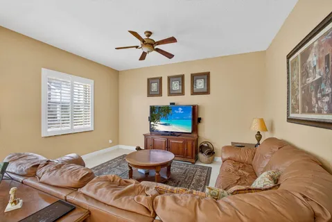 a living room with furniture and a table