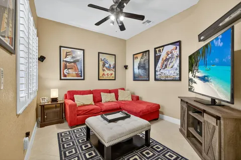 a bathroom with a tub sink shower and mirror