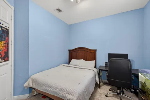 a garden with wooden fence