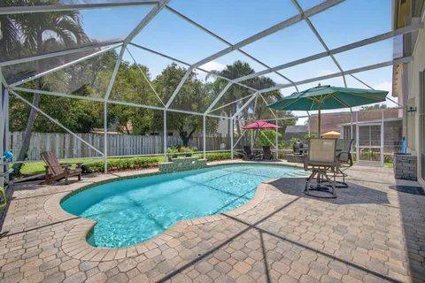 a front view of house with yard and outdoor seating