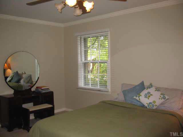 416 Crescent Court Raleigh, NC 27609 - Photo 6 of 10 Spacious master bedroom painted in a soothing neutral color. Other