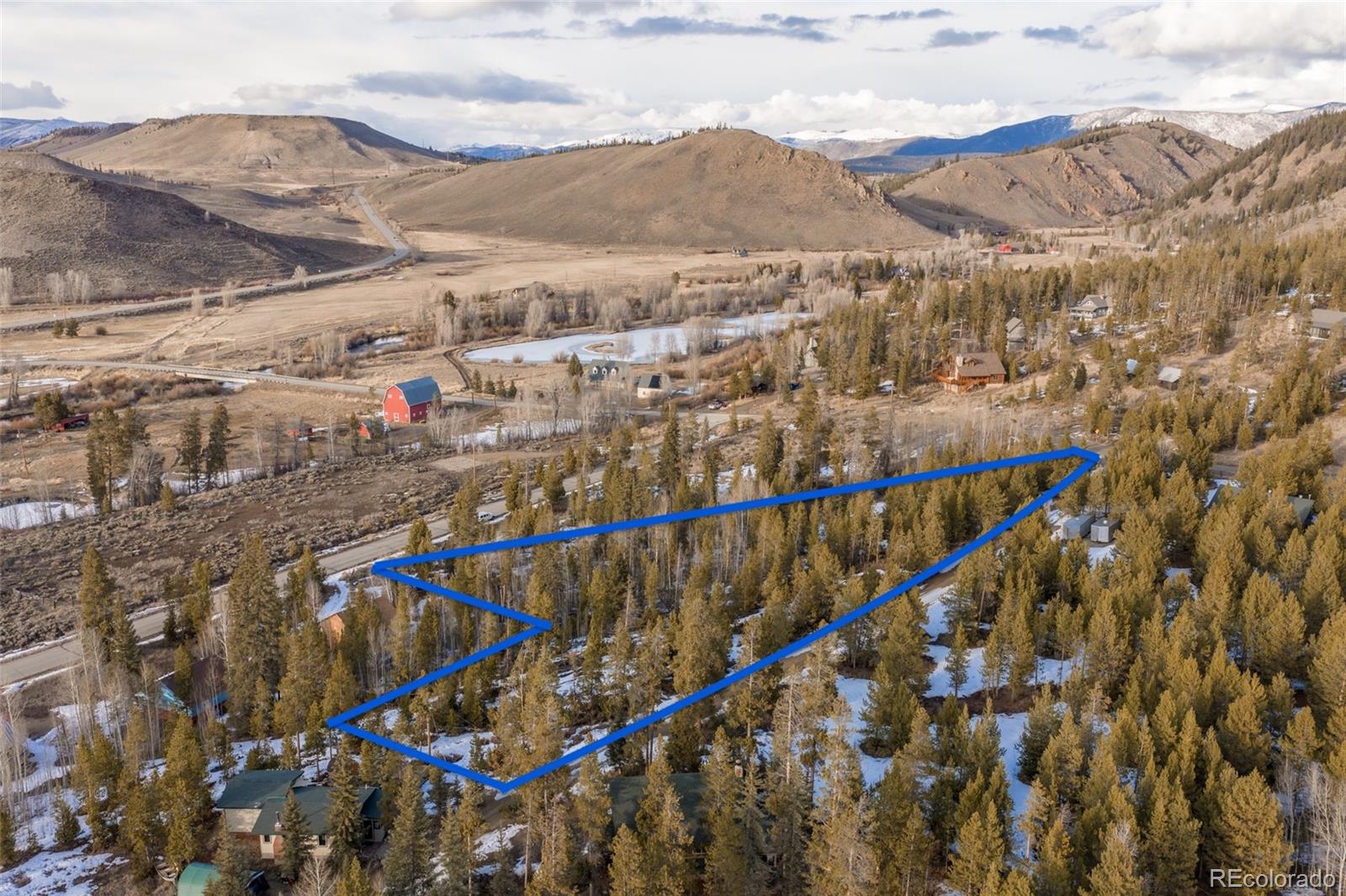 6202 County Road Granby, CO 80446 - Photo 4 of 19 a view of a houses with a mountain in the background