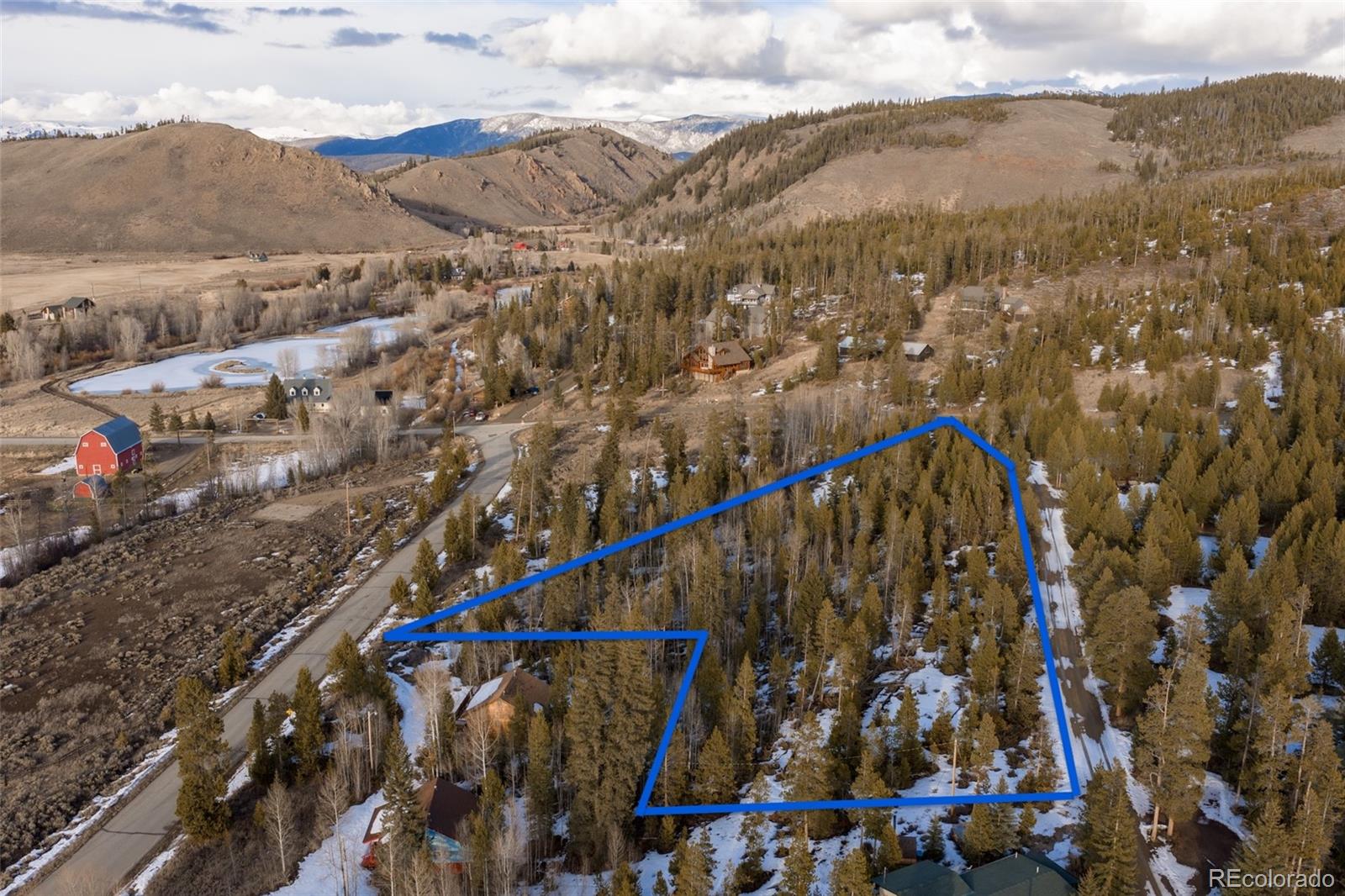 6202 County Road Granby, CO 80446 - Photo 5 of 19 a view of a city with mountains in the background