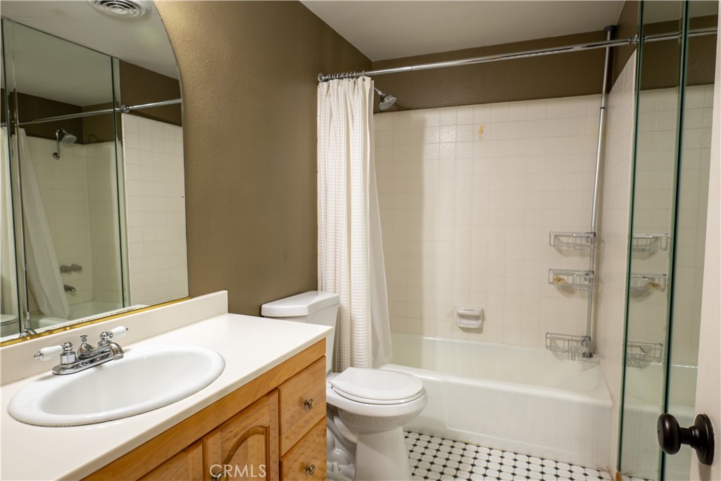 2154 Vista Entrada Newport Beach, CA 92660 - Photo 12 of 19 a bathroom with a sink toilet and shower