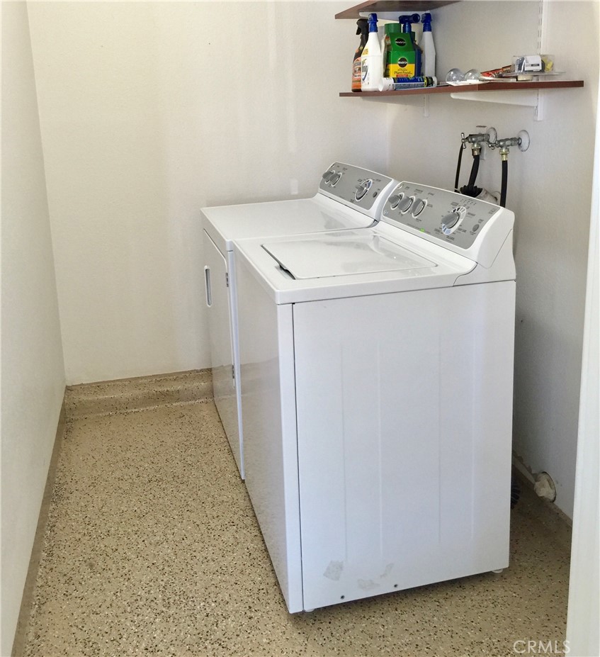 2154 Vista Entrada Newport Beach, CA 92660 - Photo 17 of 19 a utility room with dryer and washer