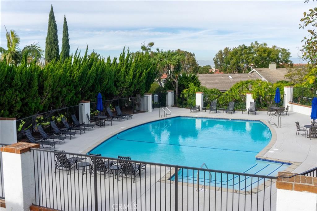 2154 Vista Entrada Newport Beach, CA 92660 - Photo 3 of 19 a view of a swimming pool with a patio