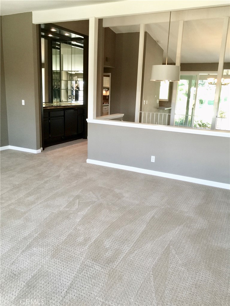 2154 Vista Entrada Newport Beach, CA 92660 - Photo 5 of 19 a view of a living room with a large window