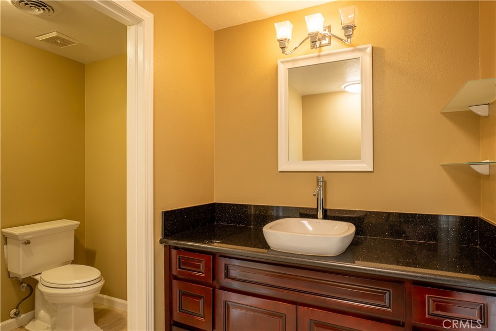 2154 Vista Entrada Newport Beach, CA 92660 - Photo 10 of 19 a bathroom with a sink and a mirror