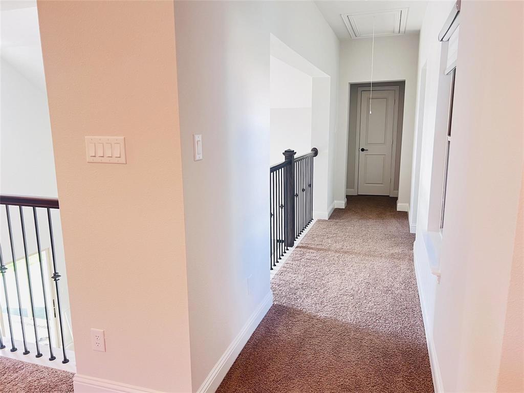 6825 Entwistle Road Frisco, TX 75034 - Photo 18 of 33 a view of a hallway with a hallway