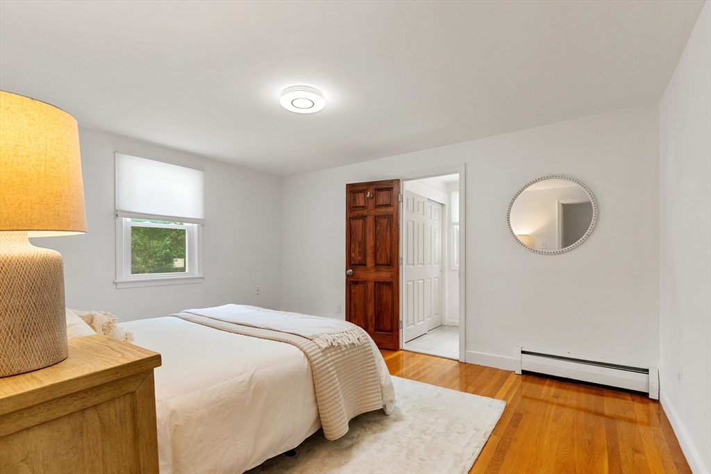 20 Oxbow Road Lexington, MA 02421 - Photo 15 of 30 a bedroom with a bed and a dresser