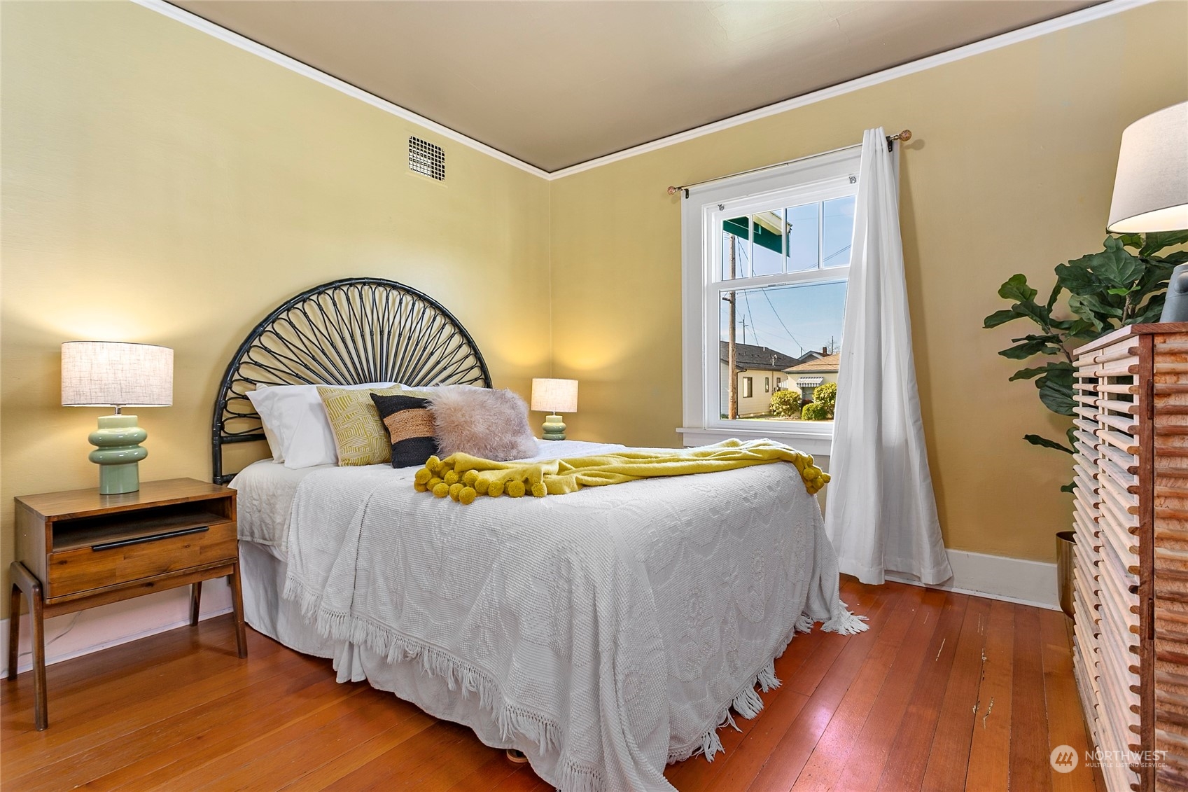 2404 I Street Bellingham, WA 98225 - Photo 19 of 38 a bedroom with a bed and wooden floor