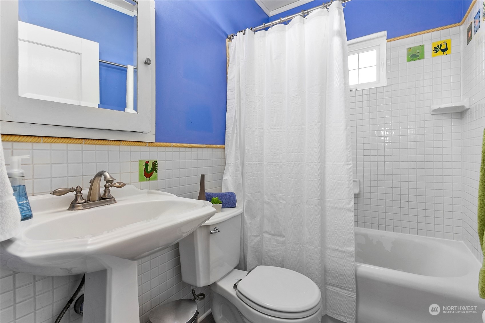 2404 I Street Bellingham, WA 98225 - Photo 20 of 38 a bathroom with a sink a toilet and shower