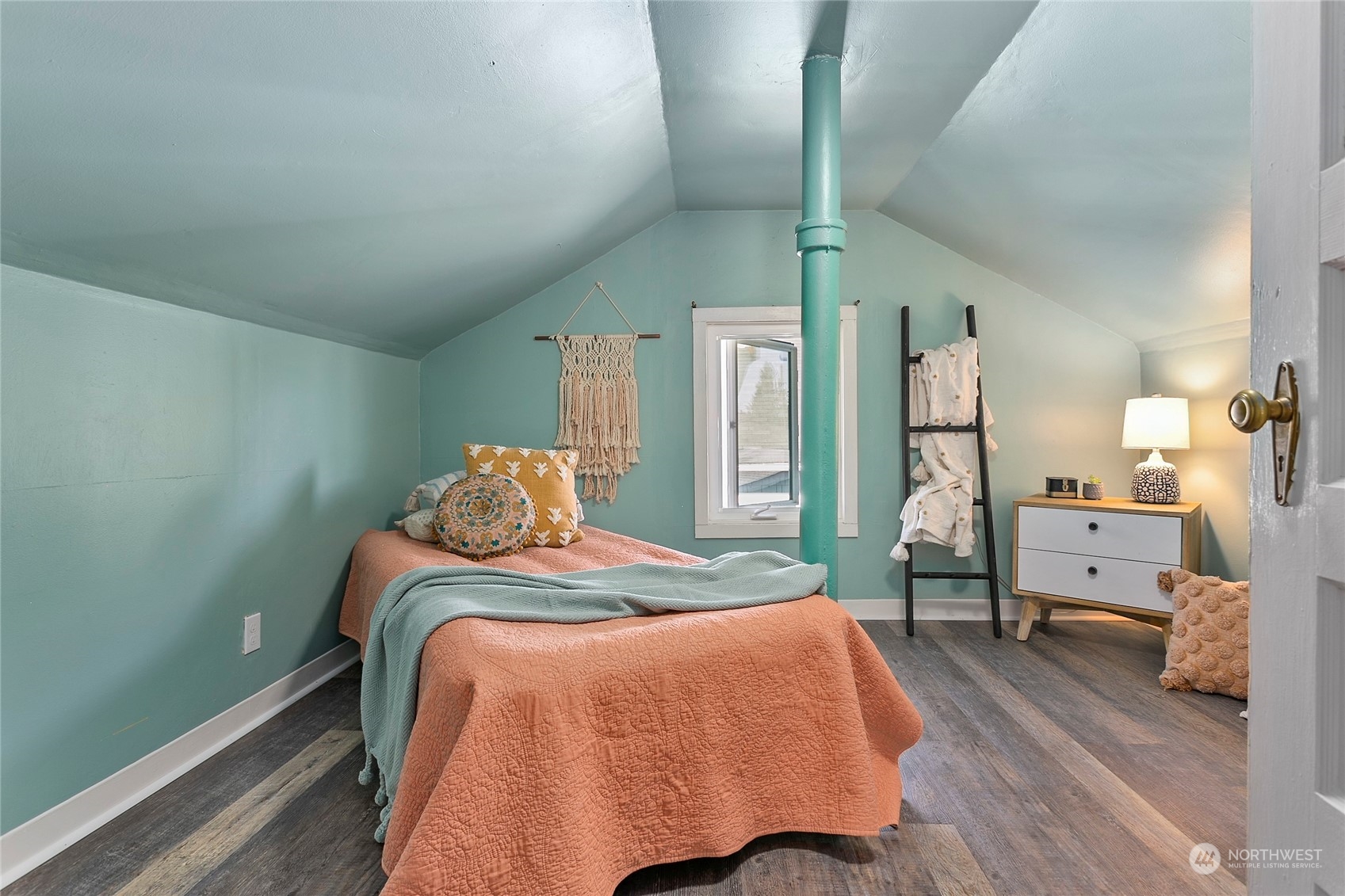 2404 I Street Bellingham, WA 98225 - Photo 25 of 38 a bedroom with a bed and wooden floor
