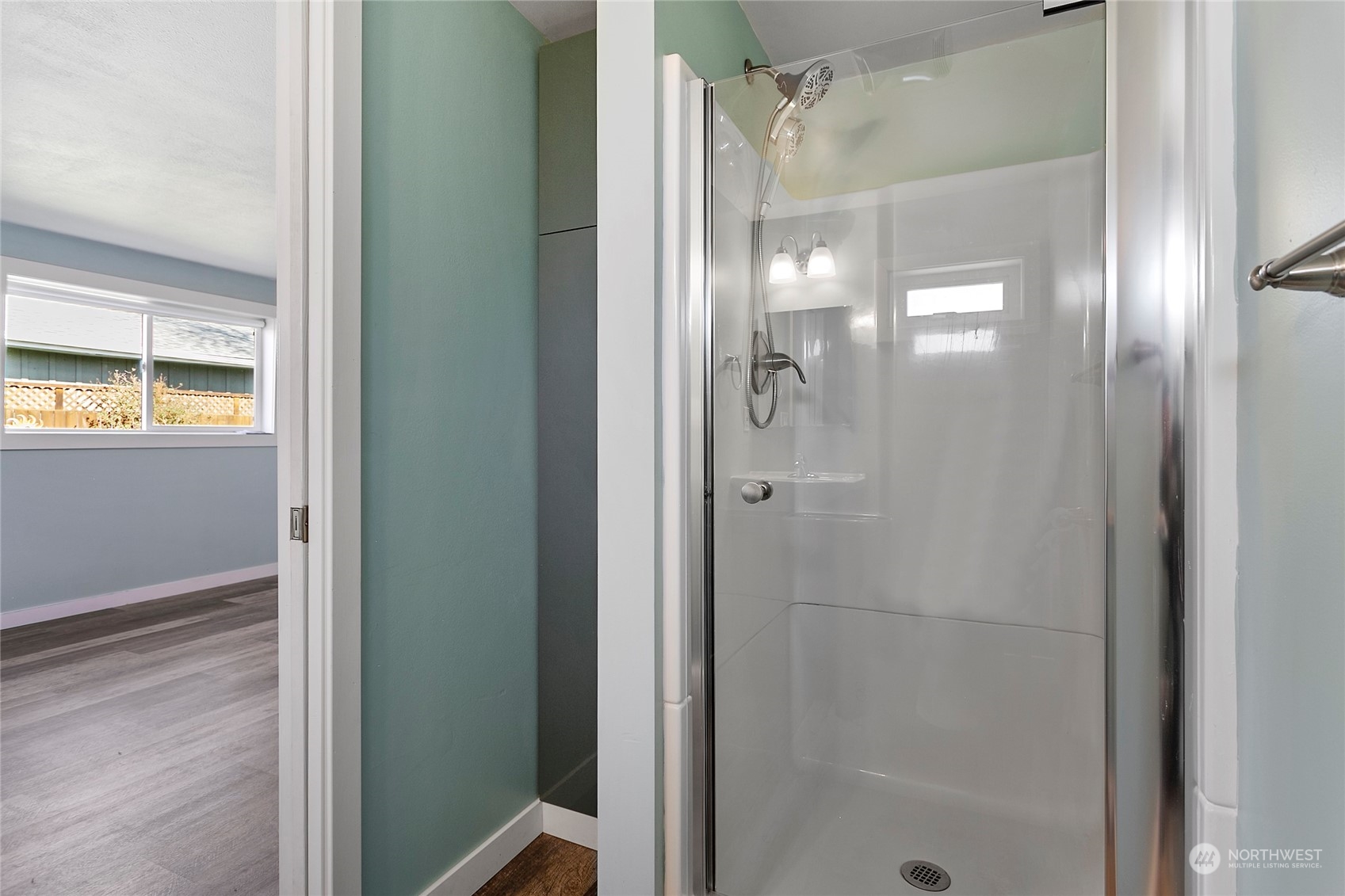 2404 I Street Bellingham, WA 98225 - Photo 34 of 38 a bathroom with a glass shower door
