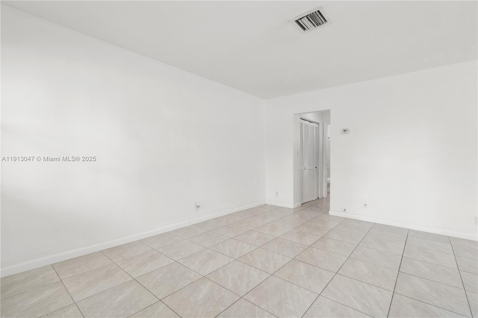 856 Southwest 10th Street, Unit 1 Hallandale Beach, FL 33009 - Photo 11 of 15 a view of an empty room