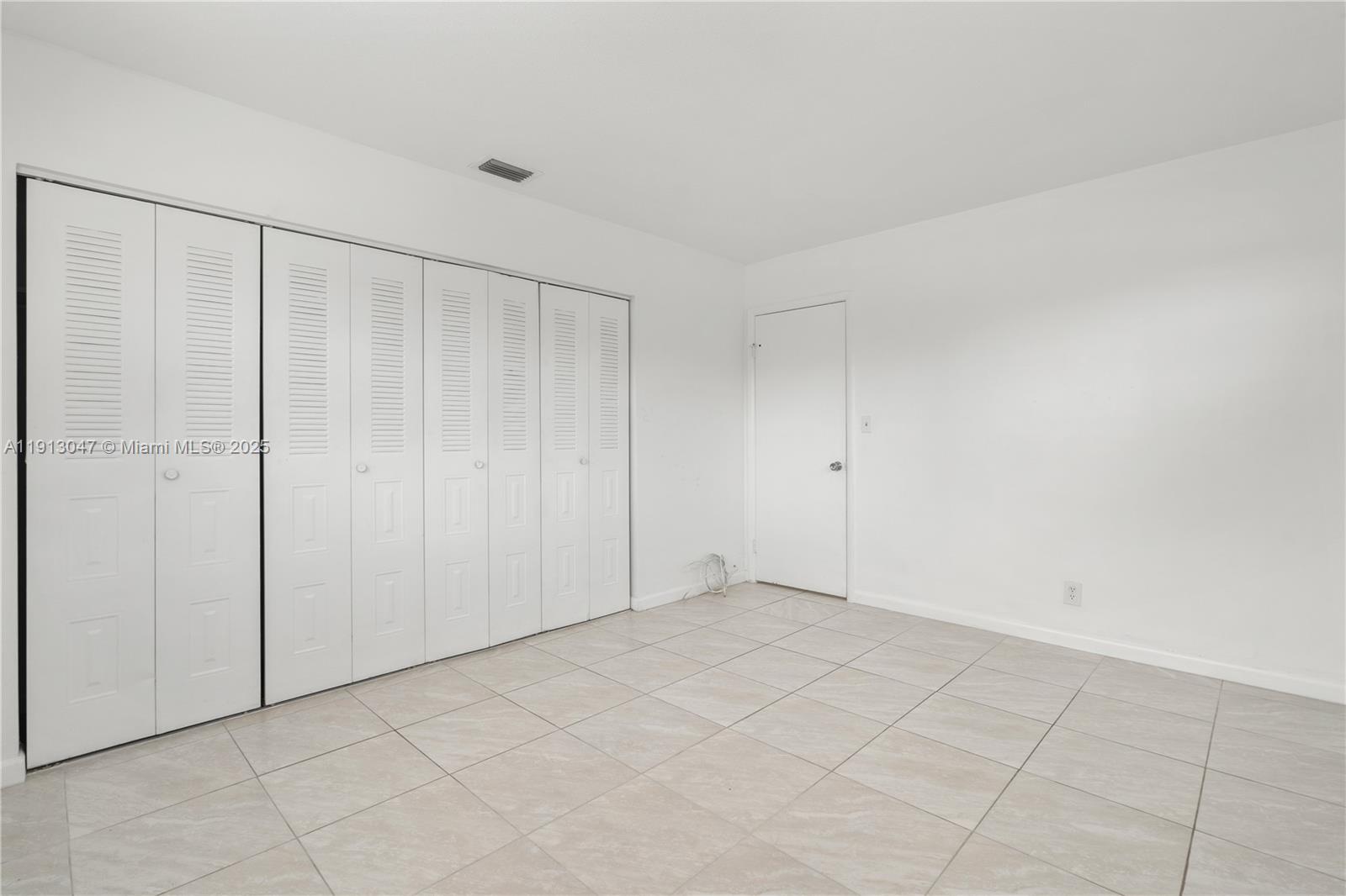 856 Southwest 10th Street, Unit 1 Hallandale Beach, FL 33009 - Photo 13 of 15 a view of an empty room