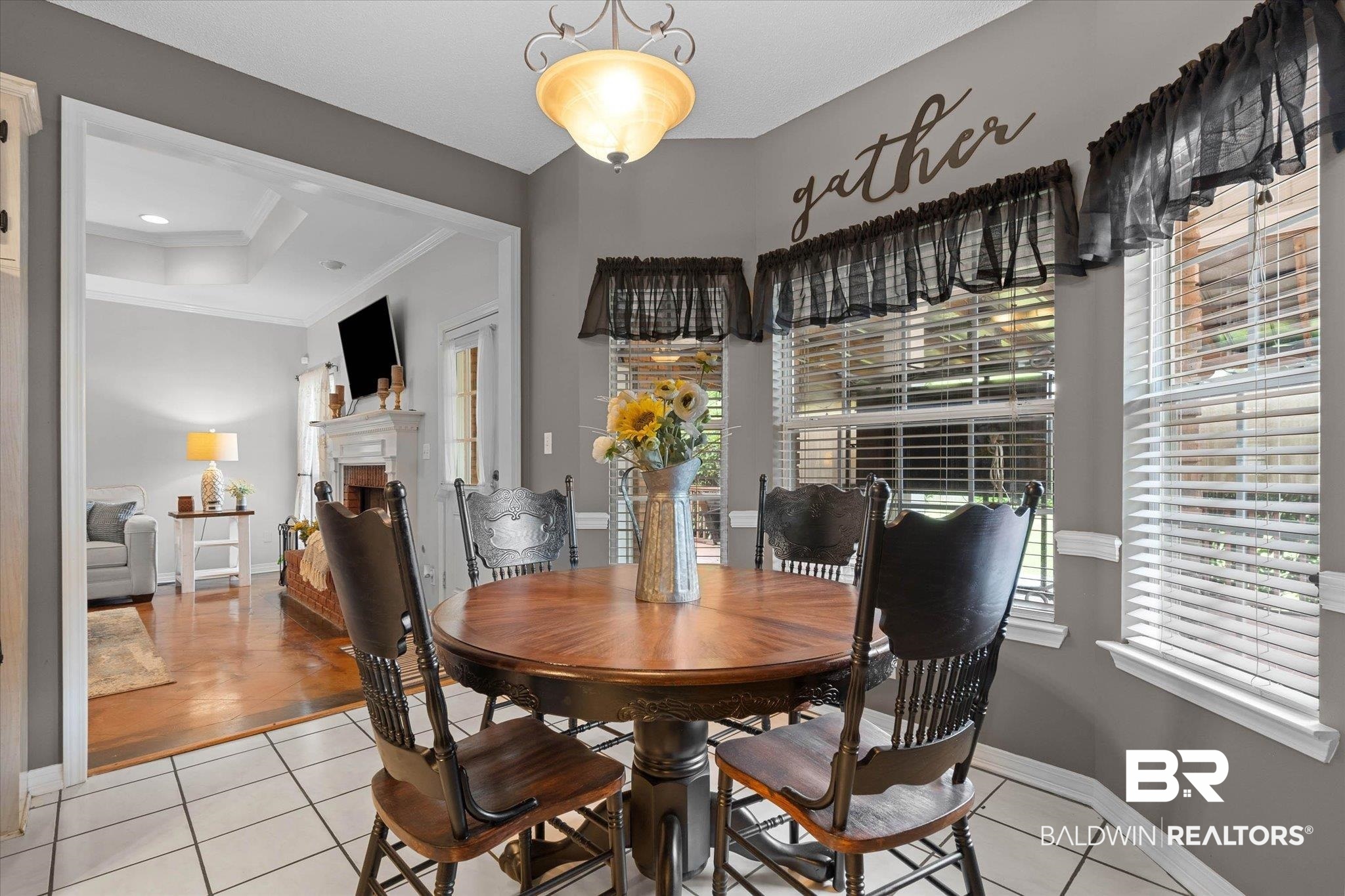 3170 Scott Dairy Loop Road West Mobile, AL 36695 - Photo 9 of 24 Breakfast nook featuring white tile flooring and a decorative ceiling light fixture