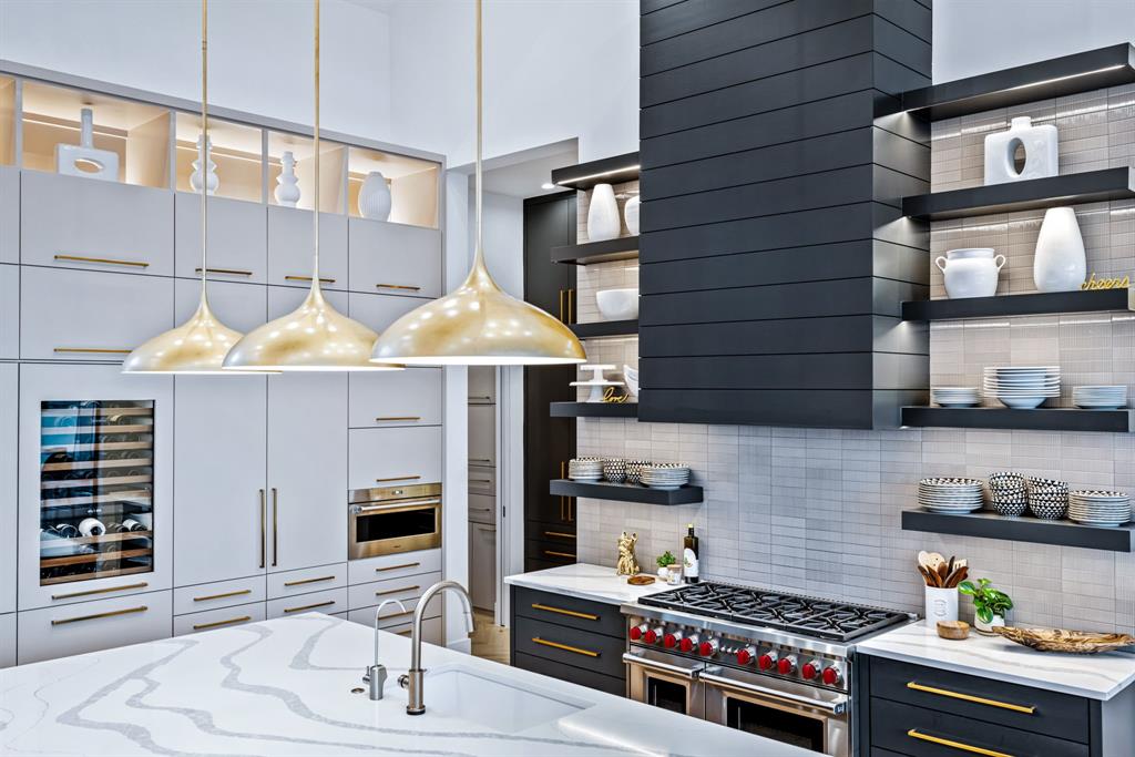 1129 Beacon Shr Road Kemp, TX 75143 - Photo 14 of 40 a kitchen with a stove and a kitchen island