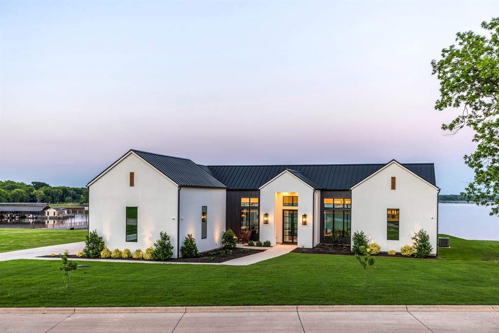 1129 Beacon Shr Road Kemp, TX 75143 - Photo 2 of 40 a front view of a house with a yard