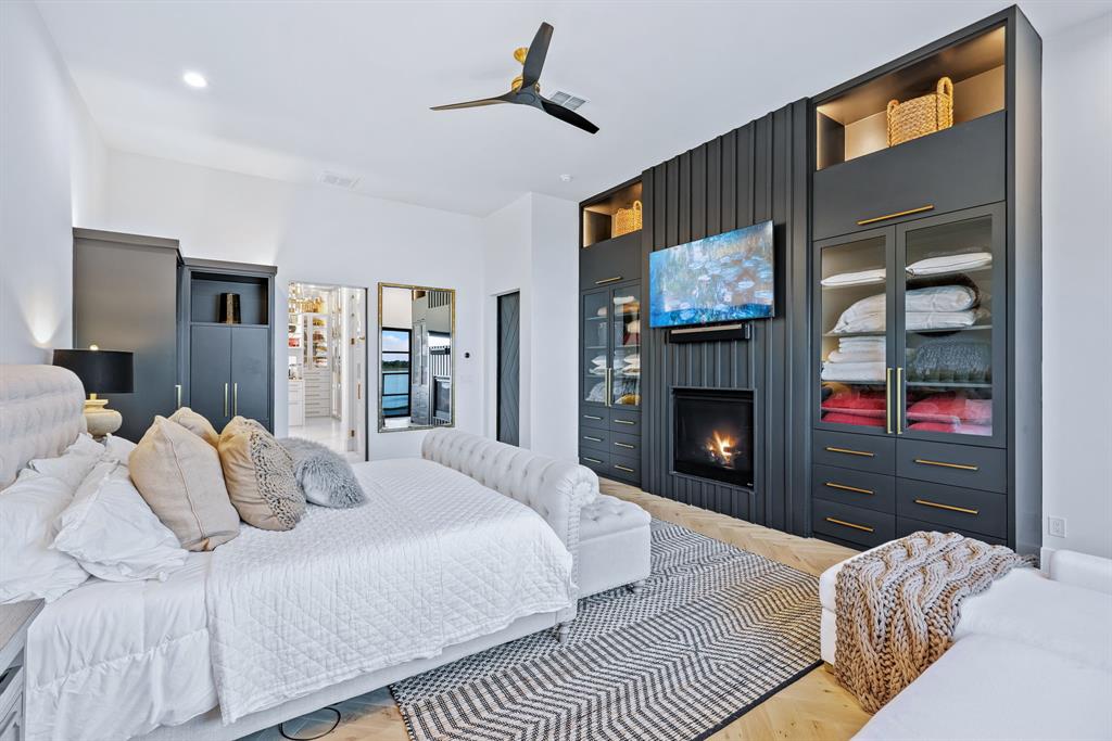 1129 Beacon Shr Road Kemp, TX 75143 - Photo 22 of 40 a bedroom with a bed and a fireplace