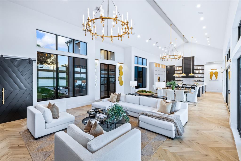 1129 Beacon Shr Road Kemp, TX 75143 - Photo 5 of 40 a living room with furniture kitchen view and a chandelier