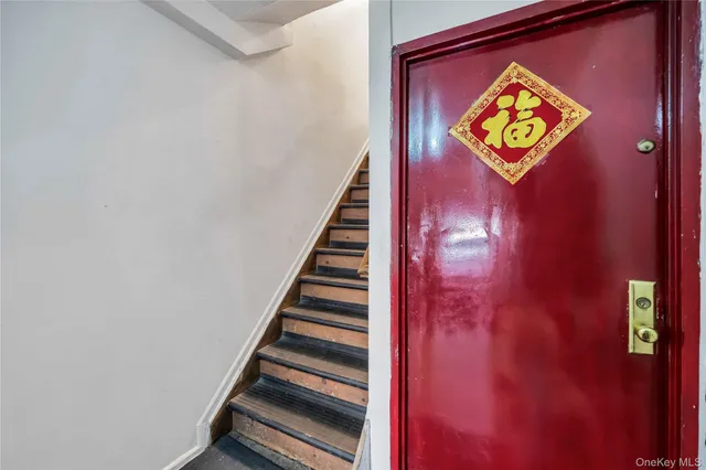 a kitchen with a refrigerator and cabinets