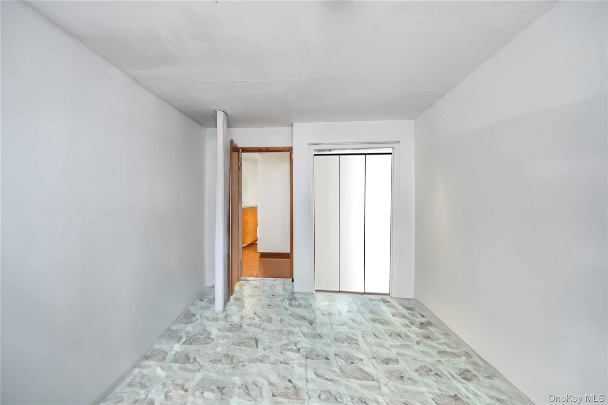 55-14 98th Street Queens, NY 11368 - Photo 35 of 49 wooden floor in an empty room