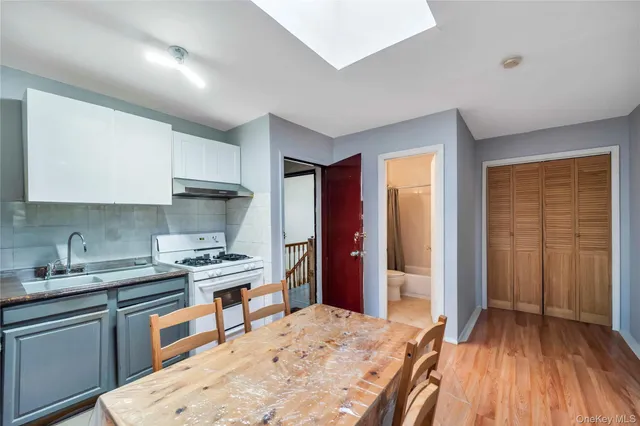 a workspace with furniture and wooden floor