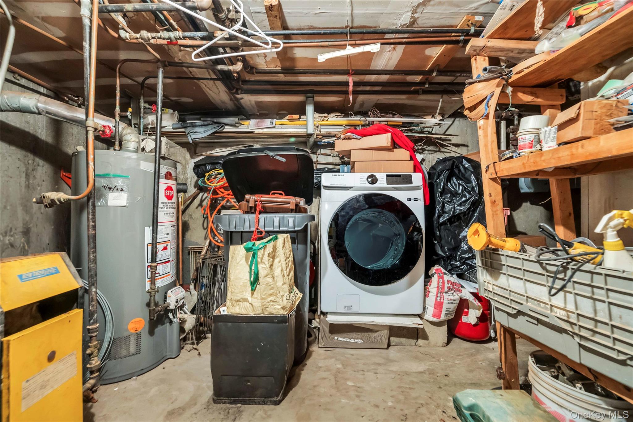 55-14 98th Street Queens, NY 11368 - Photo 10 of 49 a utility room with dryer and washer