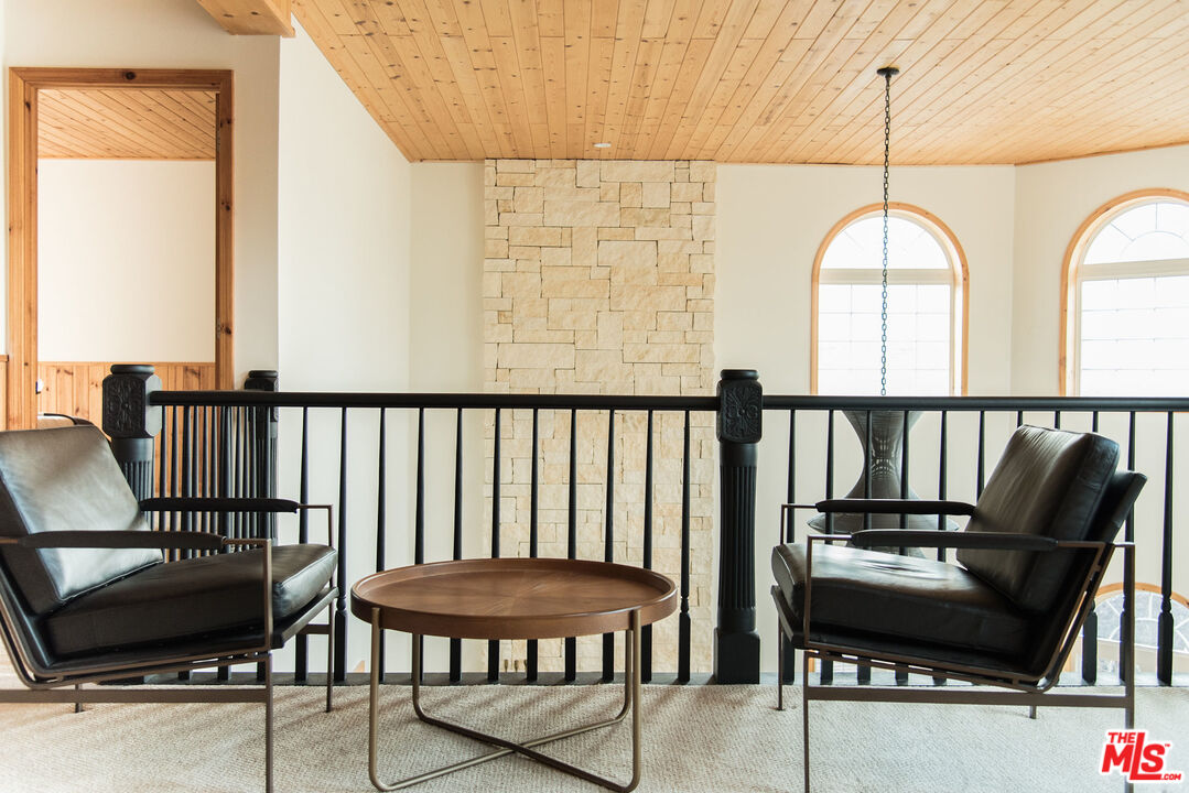 668 Cove Drive Big Bear Lake, CA 92315 - Photo 12 of 31 a view of a balcony with furniture