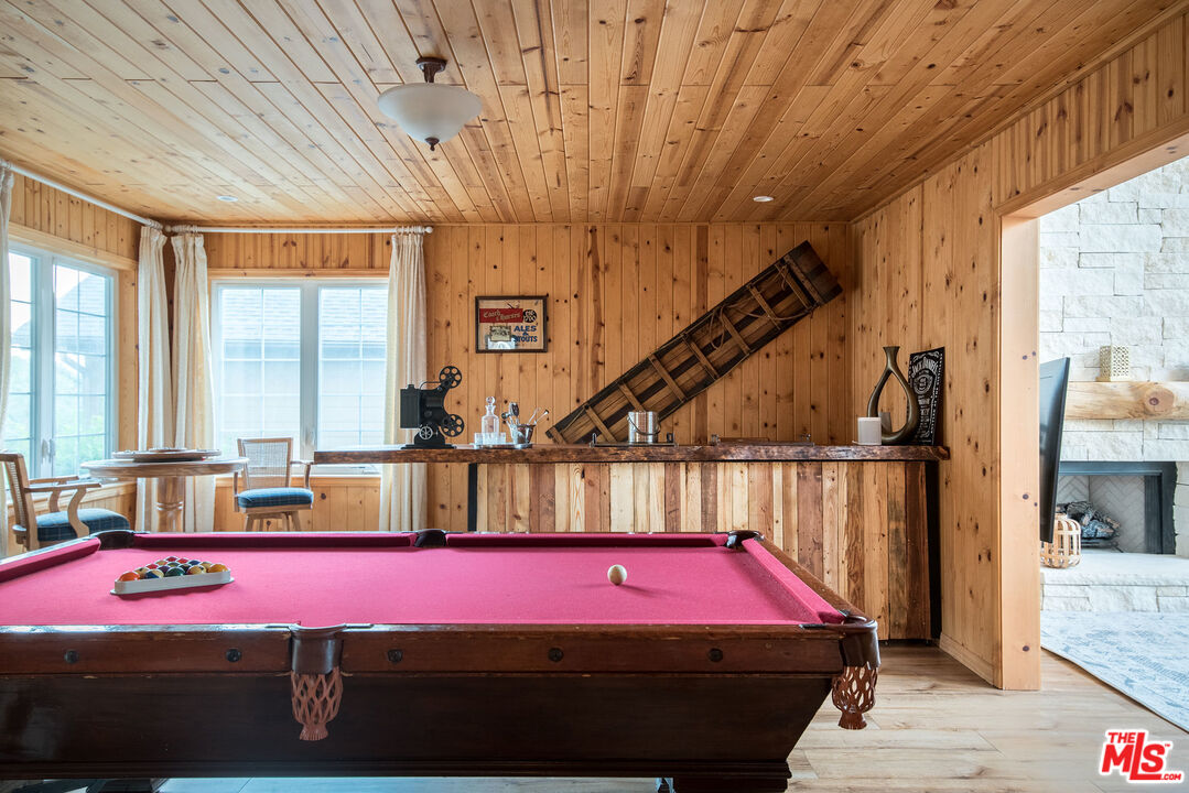 668 Cove Drive Big Bear Lake, CA 92315 - Photo 7 of 31 a front view of a house with large windows and entryway