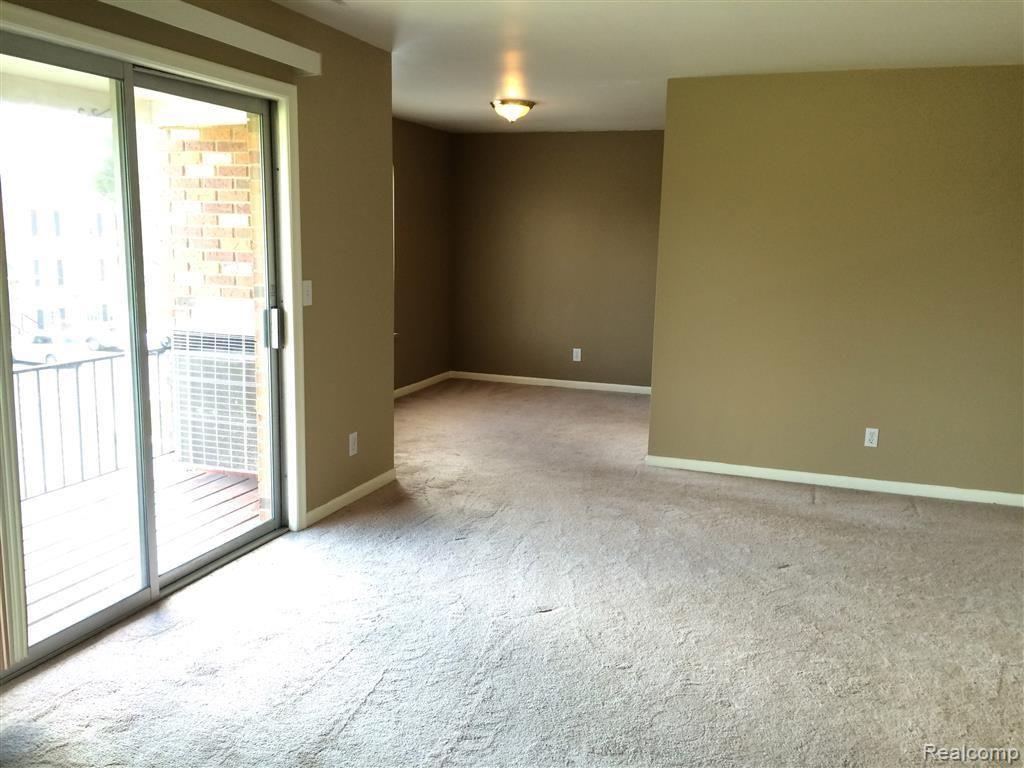 409 West Highland Road, Unit B10 Howell, MI 48843 - Photo 2 of 17 Living room