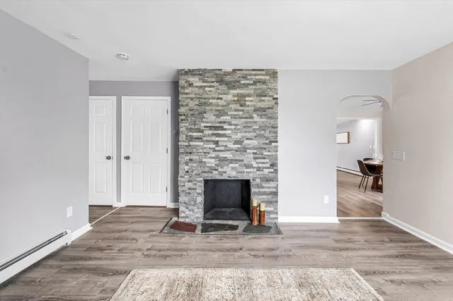 a living room with a fireplace