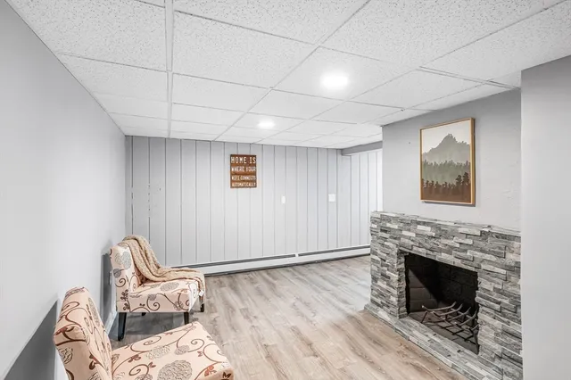a living room with furniture and windows