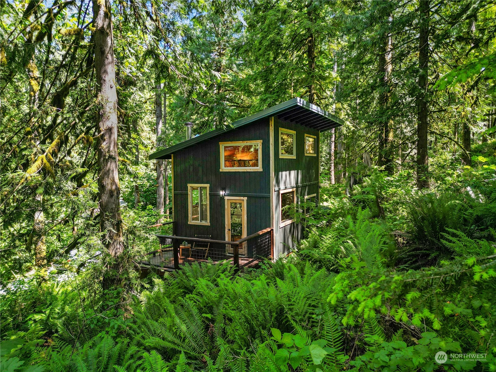 51818 South Riverside Road Gold Bar, WA 98251 - Photo 1 of 35 a sign of golf club on a tree