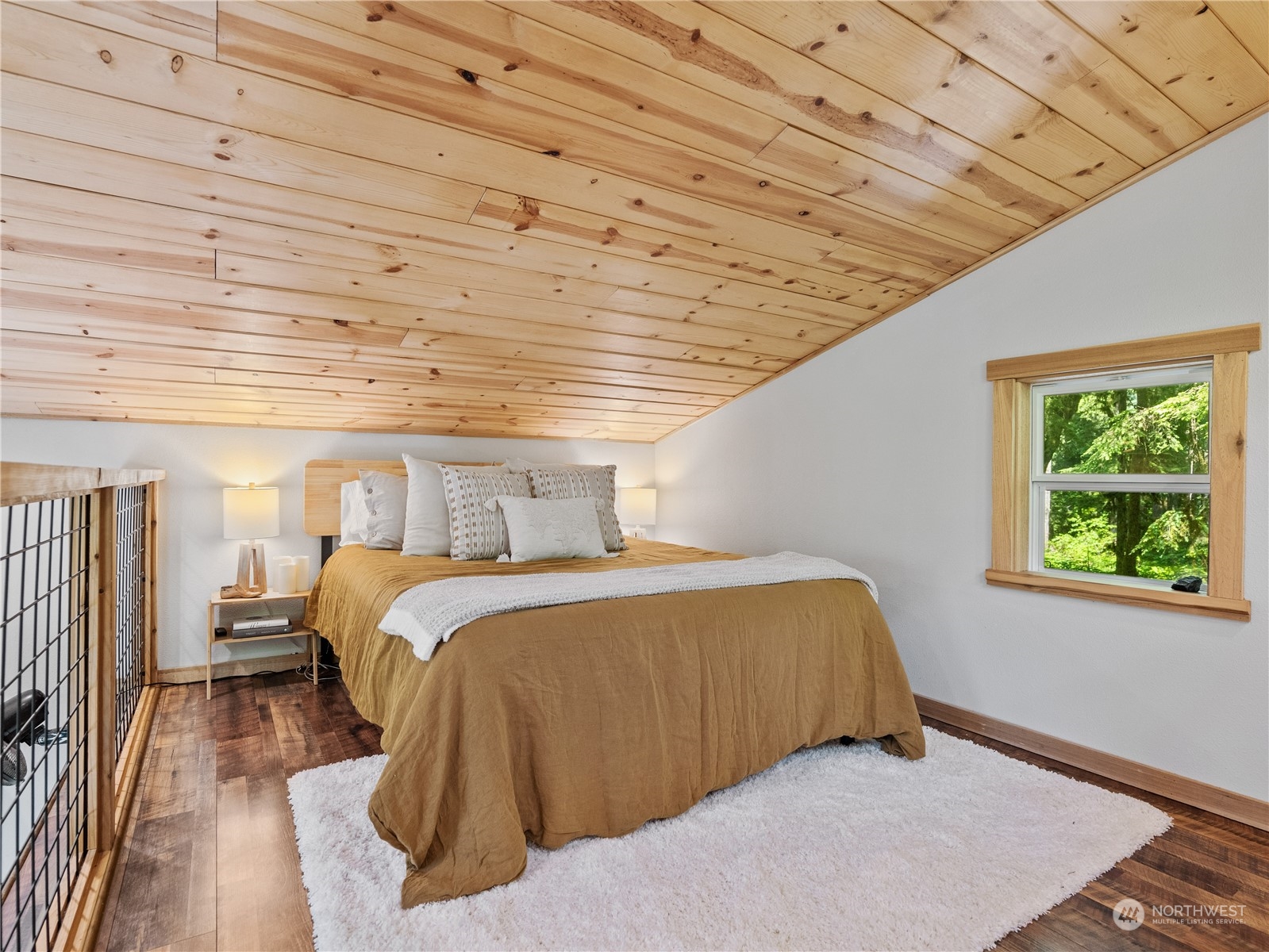 51818 South Riverside Road Gold Bar, WA 98251 - Photo 15 of 35 a bed room with a bed and a window