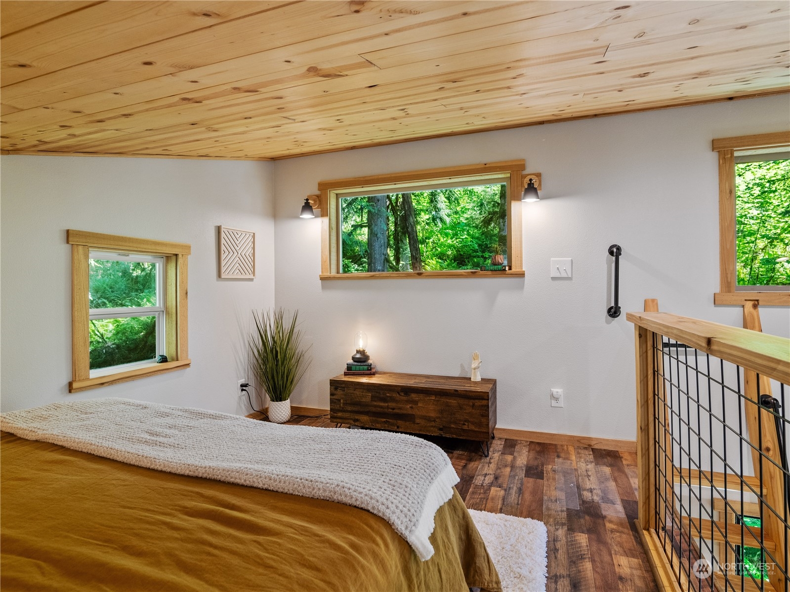 51818 South Riverside Road Gold Bar, WA 98251 - Photo 16 of 35 a bedroom with bed and a window