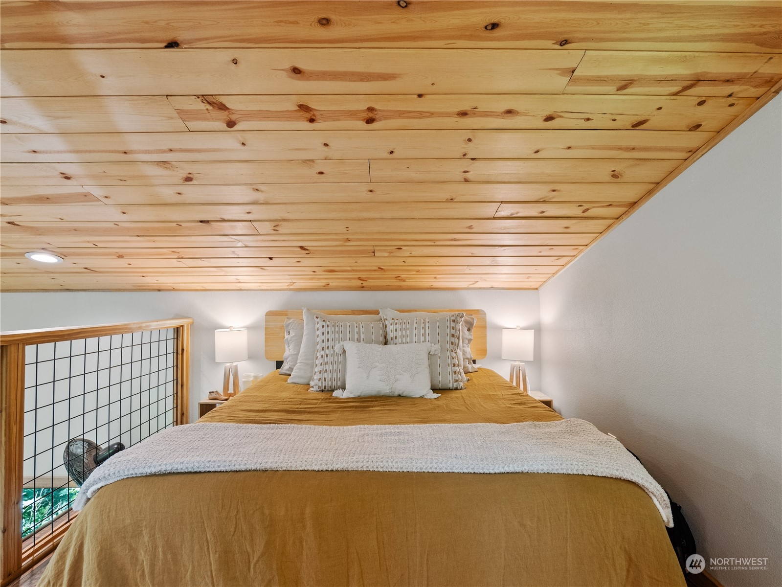 51818 South Riverside Road Gold Bar, WA 98251 - Photo 17 of 35 a bedroom with a bed and a window