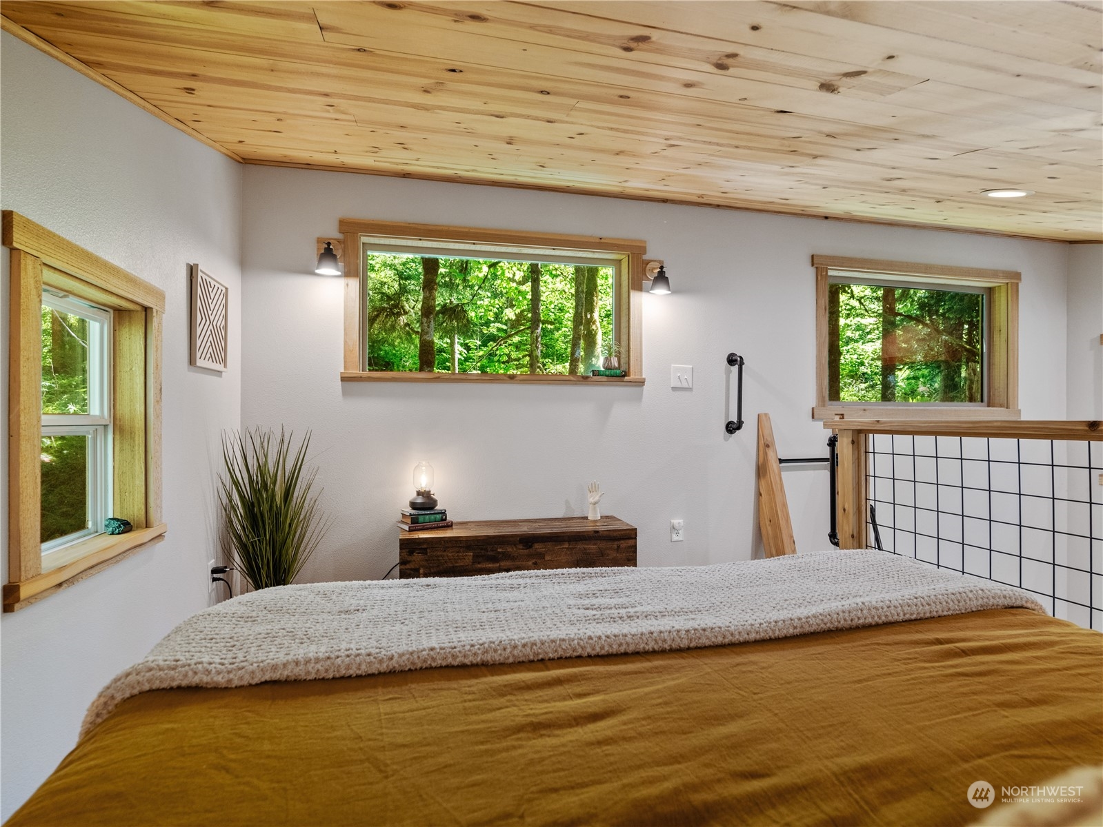 51818 South Riverside Road Gold Bar, WA 98251 - Photo 18 of 35 a bedroom with a bed and a window