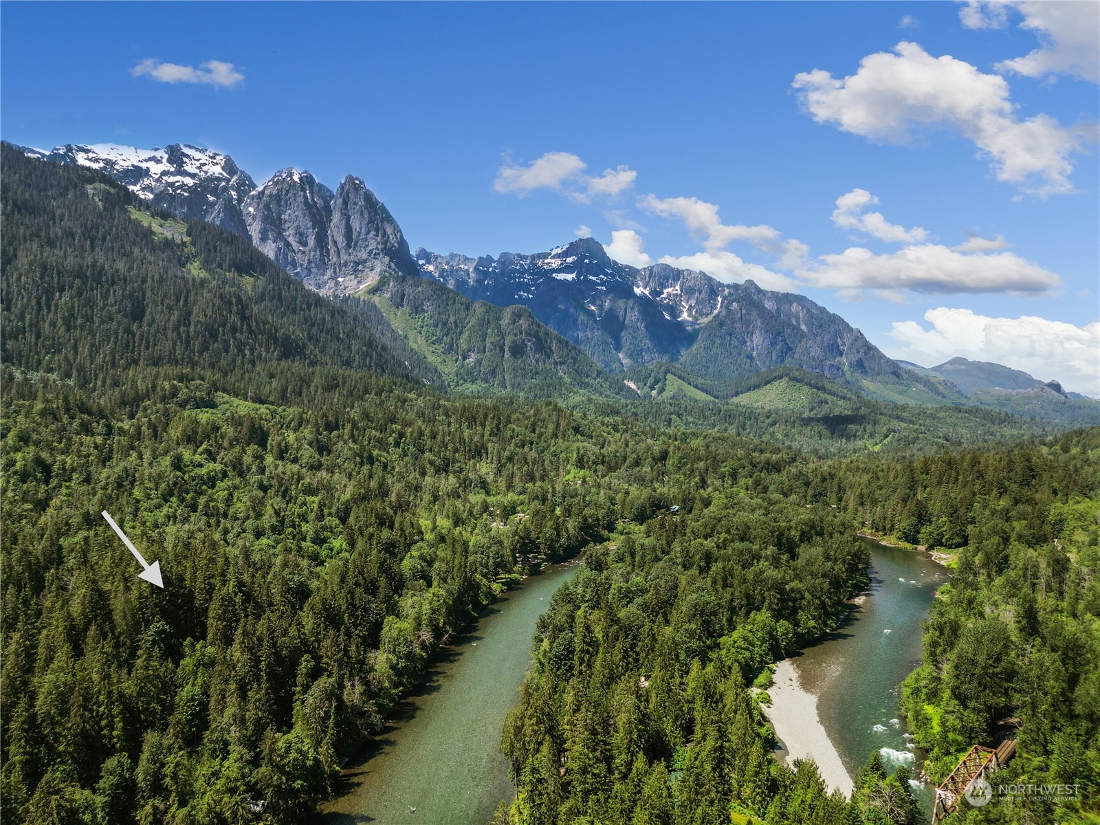 51818 South Riverside Road Gold Bar, WA 98251 - Photo 33 of 35 a view of a city with mountains in the background