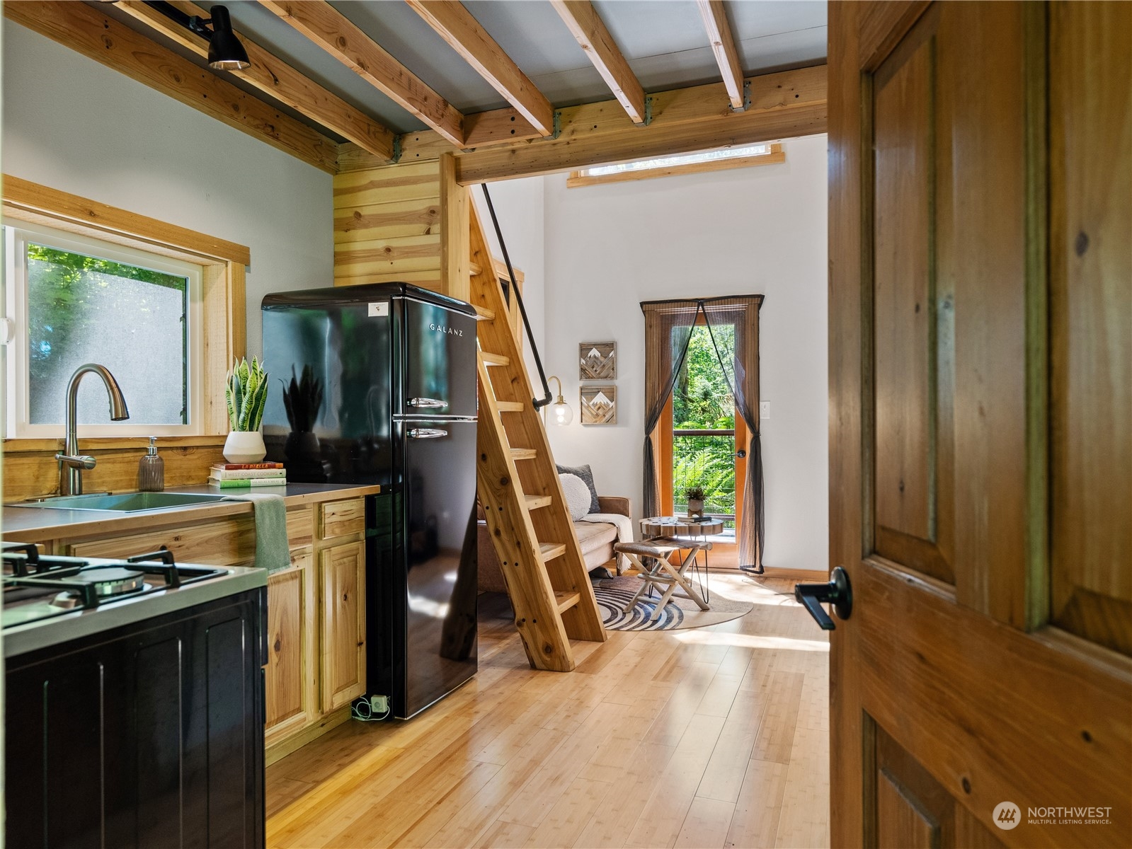 51818 South Riverside Road Gold Bar, WA 98251 - Photo 4 of 35 a view of a kitchen with a sink storage and utility