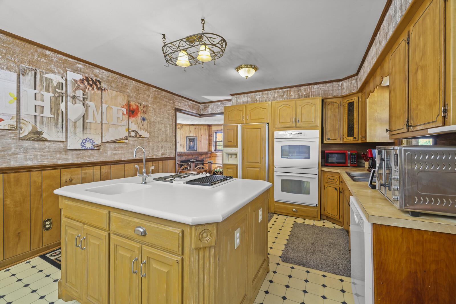 2521 Old Airport Road Hillsboro, TN 37342 - Photo 16 of 87 a kitchen with stainless steel appliances granite countertop a sink stove and refrigerator