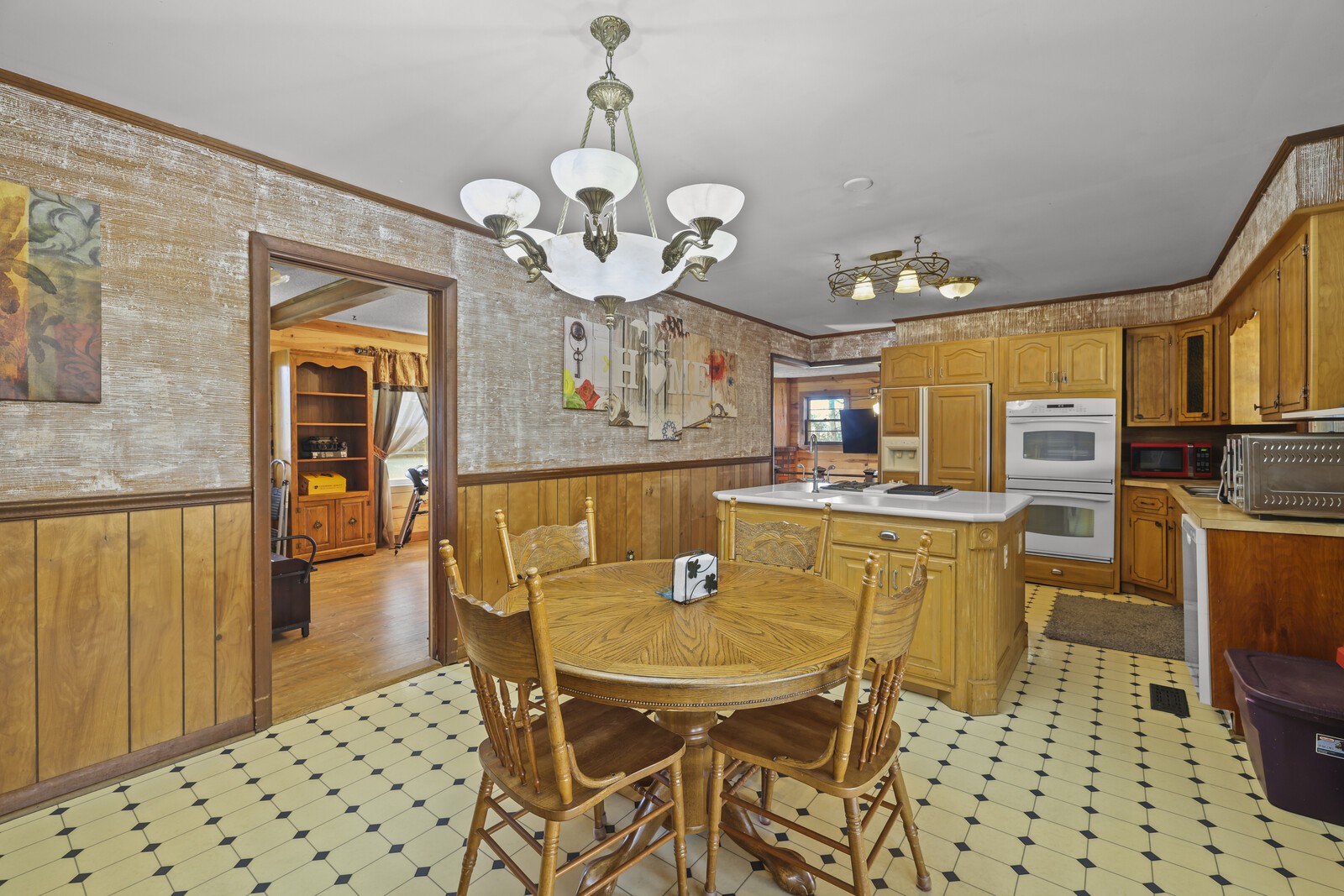 2521 Old Airport Road Hillsboro, TN 37342 - Photo 19 of 87 a view of a dining room with furniture and wooden floor