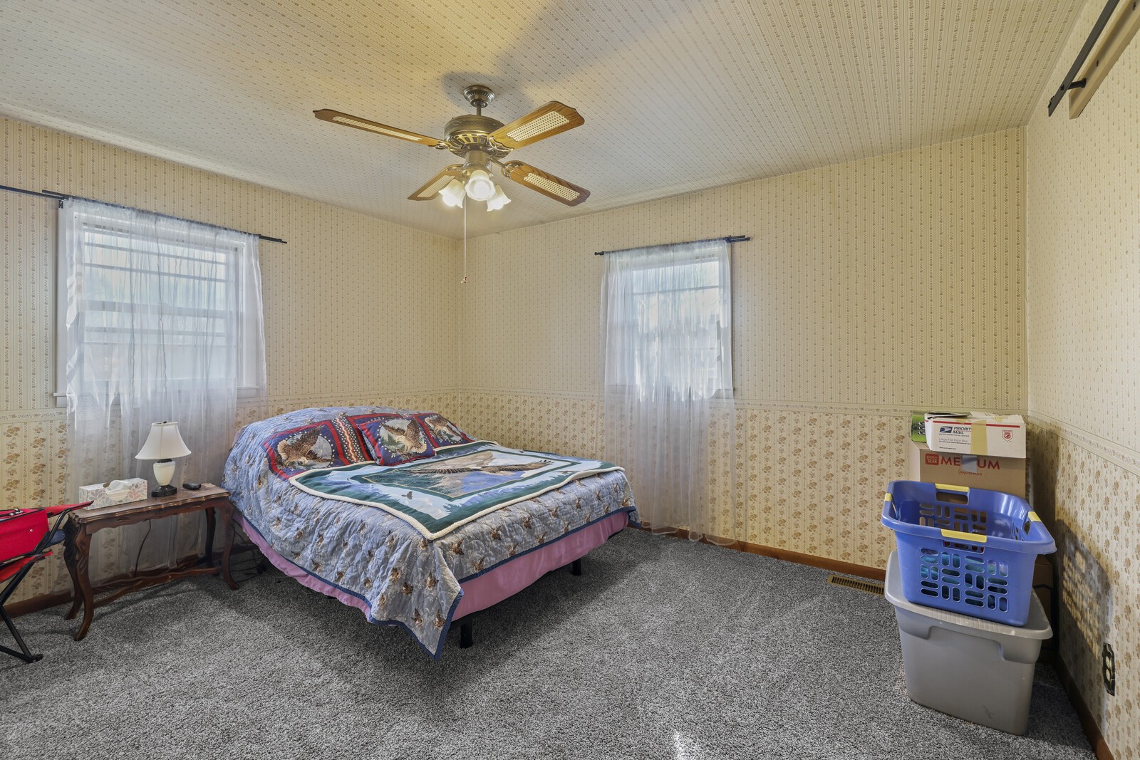2521 Old Airport Road Hillsboro, TN 37342 - Photo 26 of 87 a bedroom with a bed and a chandelier